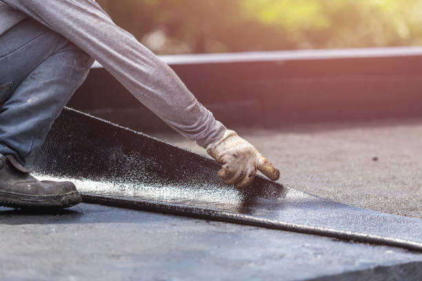 Professional Basement Waterproofing technician working in Liberty, PA